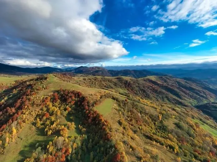 Framed Print : Sky with white and fluffy layer of clouds over green autumn hills, Aerial panoramic drone shot Framed Print : Sky with white and fluffy layer of clouds over green autumn hills, Aerial panoramic drone shot