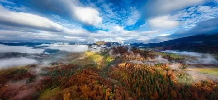 Framed Print : Sky with white and fluffy layer of clouds over green autumn hills, Aerial panoramic drone shot Framed Print : Sky with white and fluffy layer of clouds over green autumn hills, Aerial panoramic drone shot