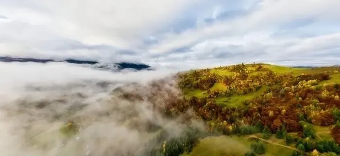 Framed Print : Sky with white and fluffy layer of clouds over green autumn hills, Aerial panoramic drone shot Framed Print : Sky with white and fluffy layer of clouds over green autumn hills, Aerial panoramic drone shot