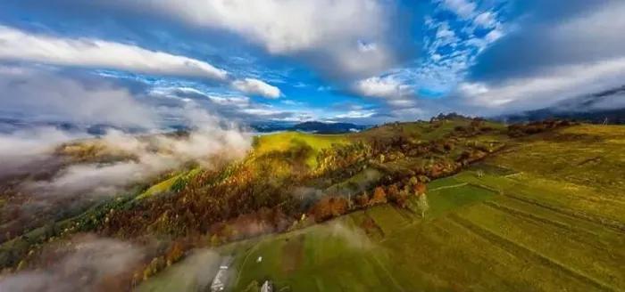 Framed Print : Sky with white and fluffy layer of clouds over green autumn hills, Aerial panoramic drone shot Framed Print : Sky with white and fluffy layer of clouds over green autumn hills, Aerial panoramic drone shot
