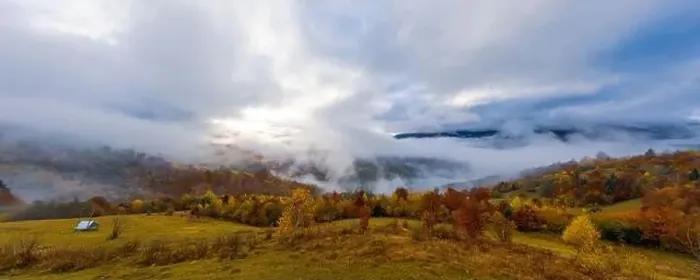 Framed Print : Sky with white and fluffy layer of clouds over green autumn hills, Aerial panoramic drone shot Framed Print : Sky with white and fluffy layer of clouds over green autumn hills, Aerial panoramic drone shot