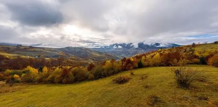 Framed Print : Sky with white and fluffy layer of clouds over green autumn hills, Aerial panoramic drone shot Framed Print : Sky with white and fluffy layer of clouds over green autumn hills, Aerial panoramic drone shot