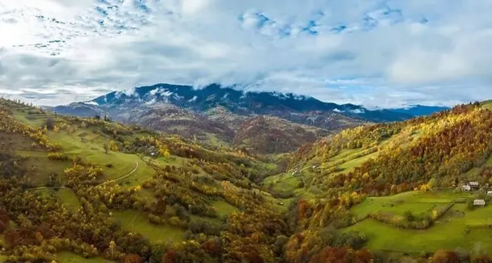 Framed Print : Sky with white and fluffy layer of clouds over green autumn hills, Aerial panoramic drone shot Framed Print : Sky with white and fluffy layer of clouds over green autumn hills, Aerial panoramic drone shot