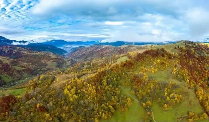 Framed Print : Sky with white and fluffy layer of clouds over green autumn hills, Aerial panoramic drone shot Framed Print : Sky with white and fluffy layer of clouds over green autumn hills, Aerial panoramic drone shot