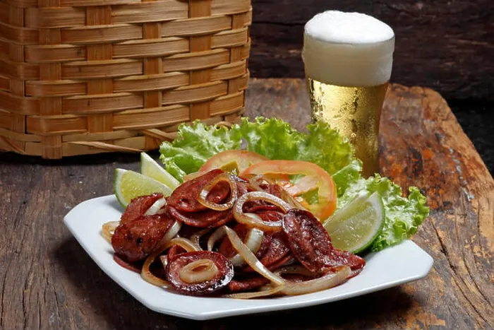 Framed Print : Slices of Calabrian Sausage and Cold Beer Framed Print : Slices of Calabrian Sausage and Cold Beer