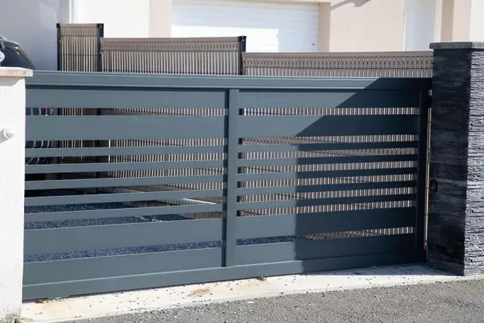 Framed Print : sliding gray gate steel big grey metal portal fence on modern house street Framed Print : sliding gray gate steel big grey metal portal fence on modern house street