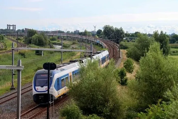 Framed Print : SLT sprinter local commuter train on track in Moordrecht in the Netherlands Framed Print : SLT sprinter local commuter train on track in Moordrecht in the Netherlands