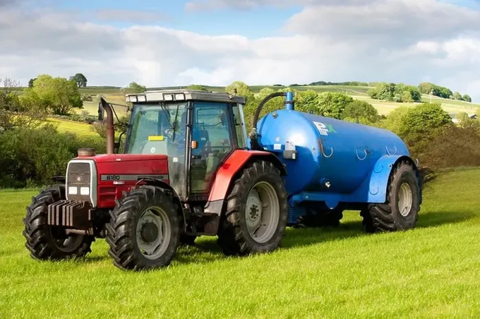 Framed Print : Slurry spreading with a vacum tanker on back of a Massey Ferguson 6180 Framed Print : Slurry spreading with a vacum tanker on back of a Massey Ferguson 6180