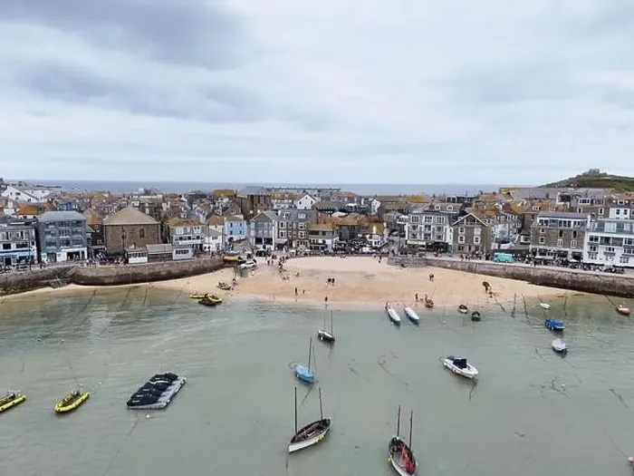 Framed Print : Small beach in harbour St Ives Cornwall on calm summers day drone, aerial Framed Print : Small beach in harbour St Ives Cornwall on calm summers day drone, aerial