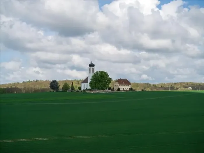 Framed Print : Small church with cemetery in the middle of blooming fruit trees and fields captured with a drone in spring Framed Print : Small church with cemetery in the middle of blooming fruit trees and fields captured with a drone in spring