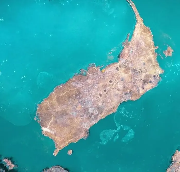 Framed Print : A small island with trees without leaves and orange dry vegetation, in the center of Hammers Lake, drone view Framed Print : A small island with trees without leaves and orange dry vegetation, in the center of Hammers Lake, drone view