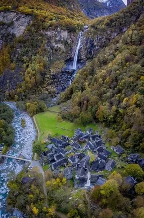 Framed Print : A small village next to a waterfall Framed Print : A small village next to a waterfall