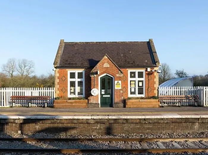 Framed Print : Small waiting room building dated 1984 on platform of rural railway station, Pewsey, Wiltshire, England, UK Framed Print : Small waiting room building dated 1984 on platform of rural railway station, Pewsey, Wiltshire, England, UK