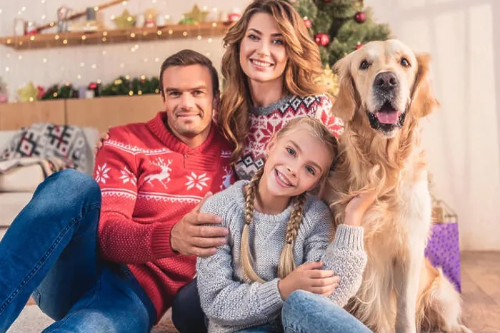 Framed Print : smiling family with golden retriever dog sitting near christmas tree with gifts Framed Print : smiling family with golden retriever dog sitting near christmas tree with gifts