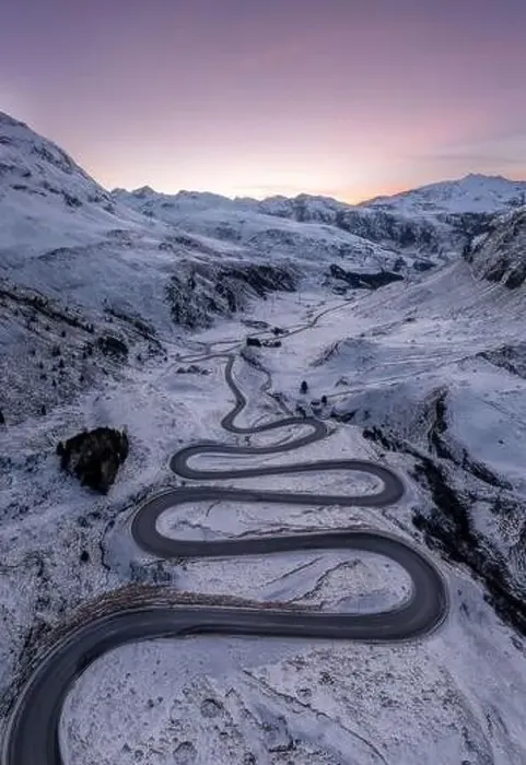 Framed Print : A snake shaped pass road in winter photographed from above Framed Print : A snake shaped pass road in winter photographed from above