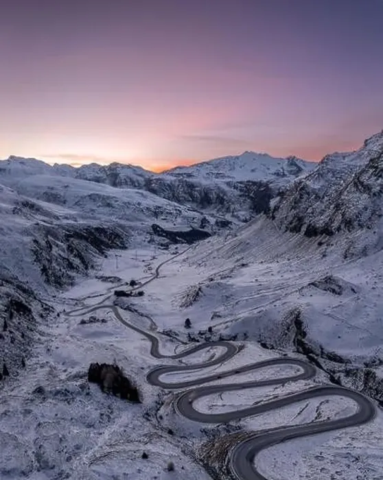 Framed Print : A snake shaped pass road in winter photographed from above Framed Print : A snake shaped pass road in winter photographed from above