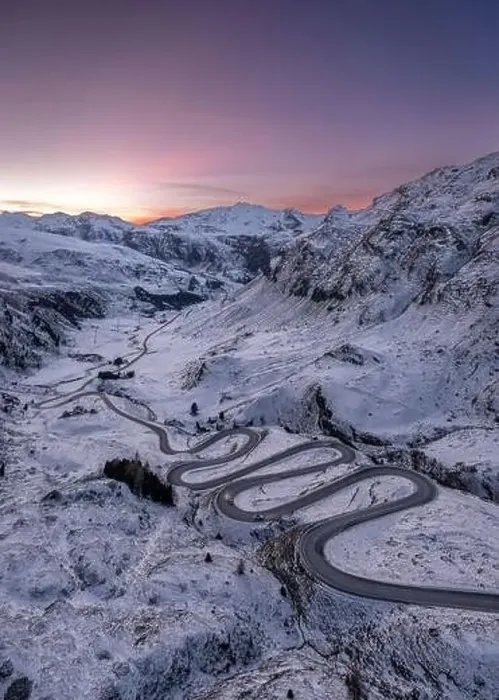 Framed Print : A snake shaped pass road in winter photographed from above Framed Print : A snake shaped pass road in winter photographed from above