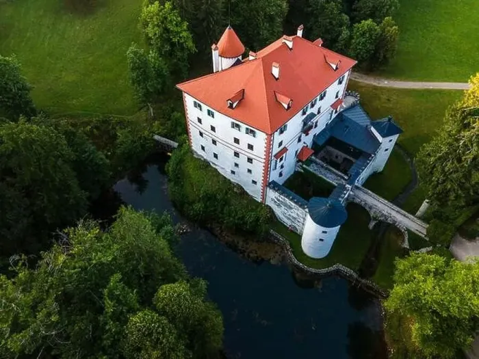Framed Print : Sneznik Castle in Slovenia, Picturesque Flowing Castle in Park with Pond. Drone Aerial View Framed Print : Sneznik Castle in Slovenia, Picturesque Flowing Castle in Park with Pond. Drone Aerial View