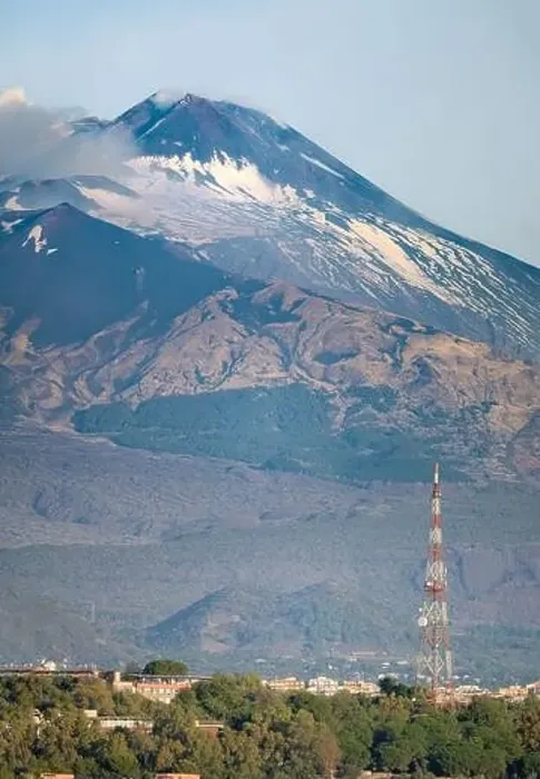 Framed Print : Snow covered Mount Etna volcano and Catania city center at sunrise Framed Print : Snow covered Mount Etna volcano and Catania city center at sunrise