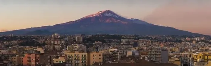 Framed Print : Snow covered Mount Etna volcano and Catania city center at sunset, from vantage point in Sicily, Italy Framed Print : Snow covered Mount Etna volcano and Catania city center at sunset, from vantage point in Sicily, Italy