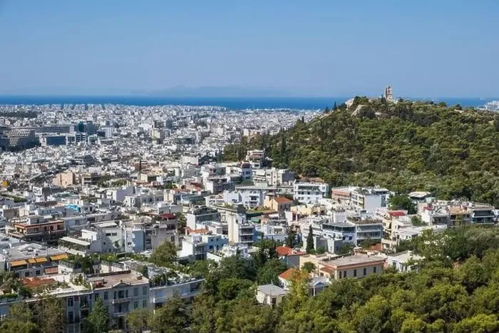 Framed Print : Snow-white houses of Greek capital, green hills against background of sea. Athens, Greece Framed Print : Snow-white houses of Greek capital, green hills against background of sea. Athens, Greece