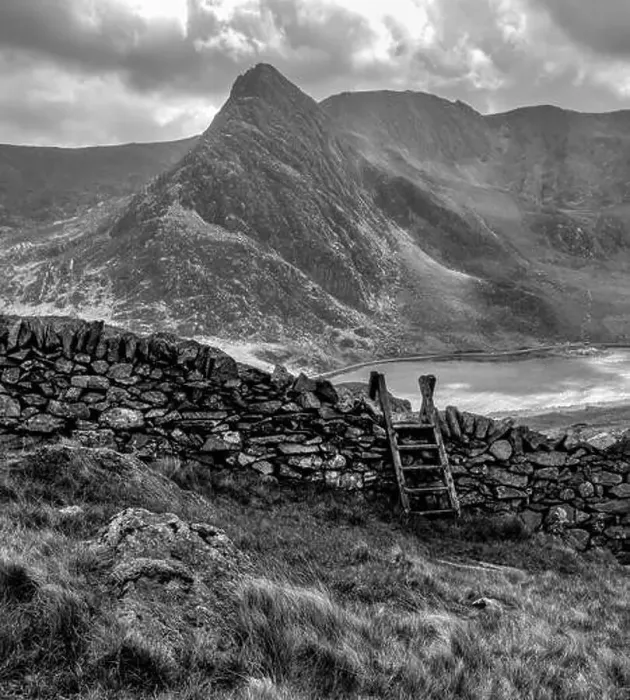 Framed Print : Snowdonia Landscape with Dry Stone Wall and Stile, Lake Ogwen and Tryfan Framed Print : Snowdonia Landscape with Dry Stone Wall and Stile, Lake Ogwen and Tryfan
