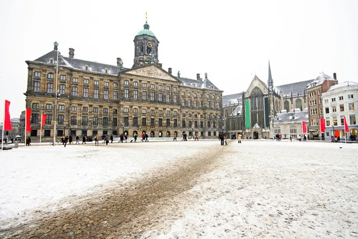 Framed Print : Snowy Damsquare in Amsterdam the Netherlands in winter Framed Print : Snowy Damsquare in Amsterdam the Netherlands in winter