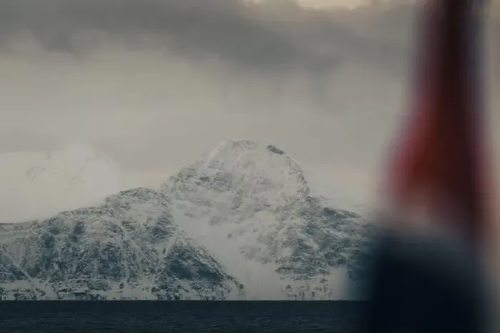 Framed Print : Snowy mountain behind Norwegian flag in the arctic Lyngen Alps in Norway Framed Print : Snowy mountain behind Norwegian flag in the arctic Lyngen Alps in Norway