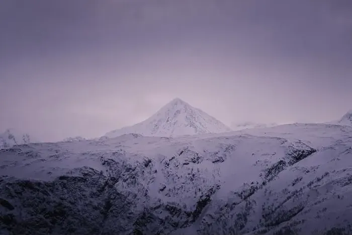 Framed Print : Snowy mountain peak under pink sky clouds in the Lyngen Alps in northern Norway Framed Print : Snowy mountain peak under pink sky clouds in the Lyngen Alps in northern Norway