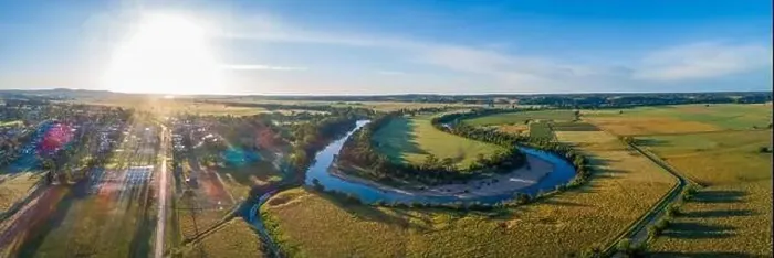 Framed Print : Snowy River bends and Orbost township at sunset - wide aerial panorama