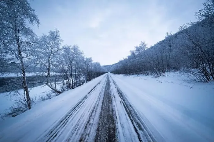 Framed Print : Snowy road among the trees covered in snow in Lapland Framed Print : Snowy road among the trees covered in snow in Lapland