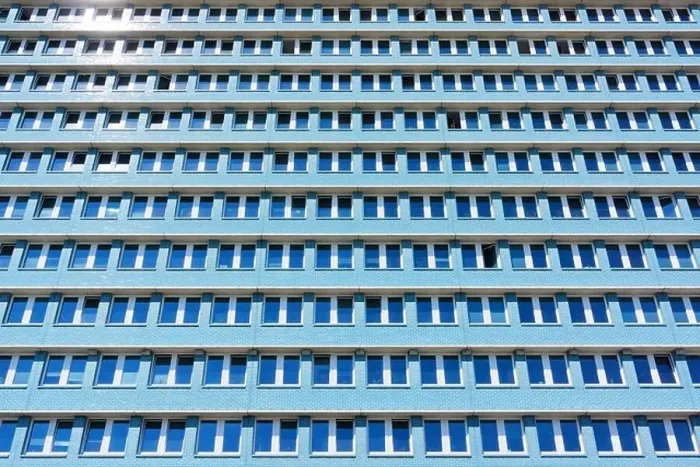 Framed Print : Former socialist GDR (DDR) architecture in East Berlin. Blue building in the street Frankfurter Allee / Karl Marx Framed Print : Former socialist GDR (DDR) architecture in East Berlin. Blue building in the street Frankfurter Allee / Karl Marx
