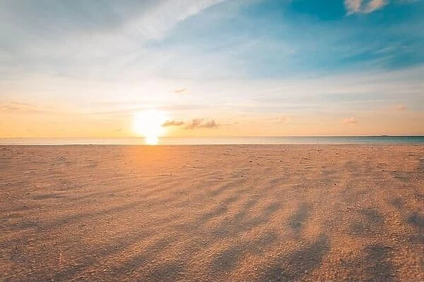 Soft sand, calm ocean waves in tropical sea coast, seaside under colorful cloudy sky. Amazing sunset beach landscape, zen paradise, tranquil island