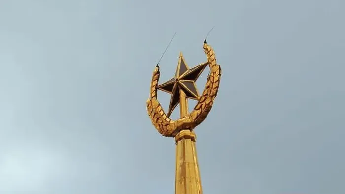 Framed Print : Soviet symbol, golden spire on a cloudy sky background. Stock footage. Golden star and ears of wheat Framed Print : Soviet symbol, golden spire on a cloudy sky background. Stock footage. Golden star and ears of wheat