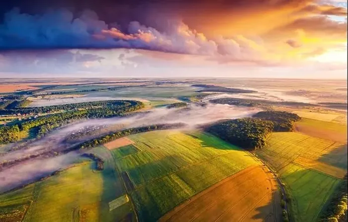 Framed Print : Spectacular summer view from flying drone of Ukrainian countryside with field of wheat and foggy valleys