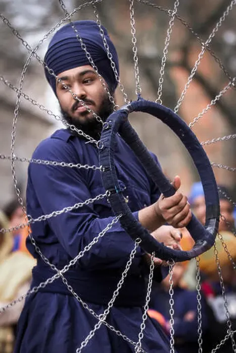 Framed Print : Spinning Sikh weapons, chains, chakar bolo Framed Print : Spinning Sikh weapons, chains, chakar bolo