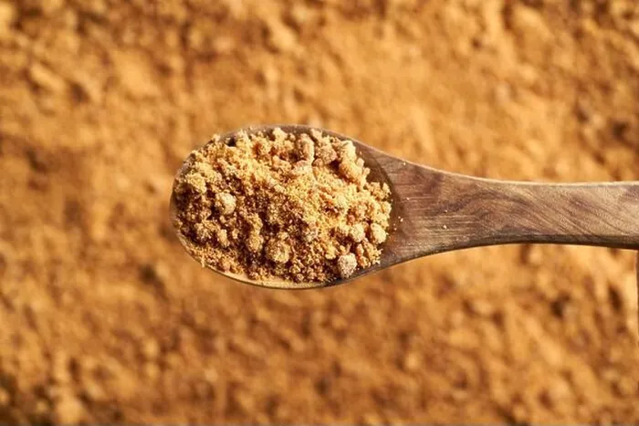 Framed Print : A spoonful of panela or rapadura - healthy sweetener made by evaporating sugercane juice, top view Framed Print : A spoonful of panela or rapadura - healthy sweetener made by evaporating sugercane juice, top view