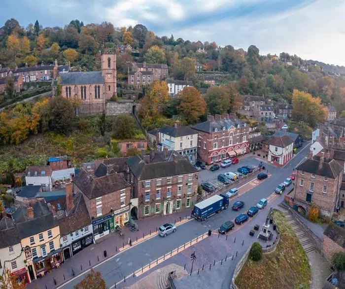 Framed Print : Square panoramic drone shoot over centre of historic Victorian town at autumn. Ironbridge in Shropshire, UK Framed Print : Square panoramic drone shoot over centre of historic Victorian town at autumn. Ironbridge in Shropshire, UK