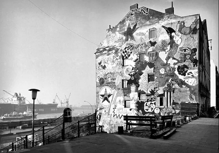 Framed Print : One of the squatted and colorfully decorated houses in Hafenstrasse on St. Pauli with a view of the Elbe and Dock 11 of Blohm und Voss. 1988 - Christo Framed Print : One of the squatted and colorfully decorated houses in Hafenstrasse on St. Pauli with a view of the Elbe and Dock 11 of Blohm und Voss. 1988 - Christo
