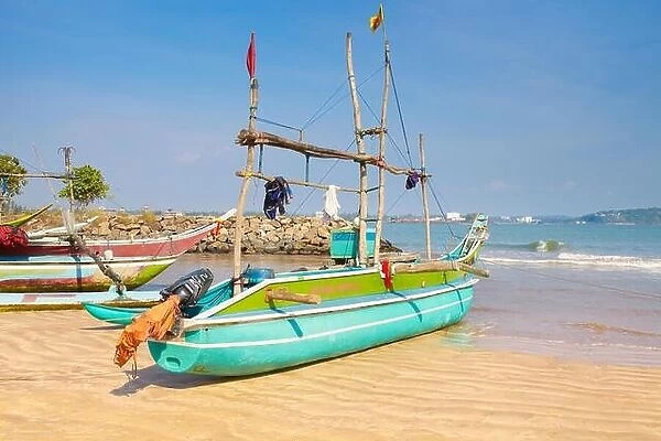 Sri Lanka - Galle, traditional wooden painted fishing boats in the port
