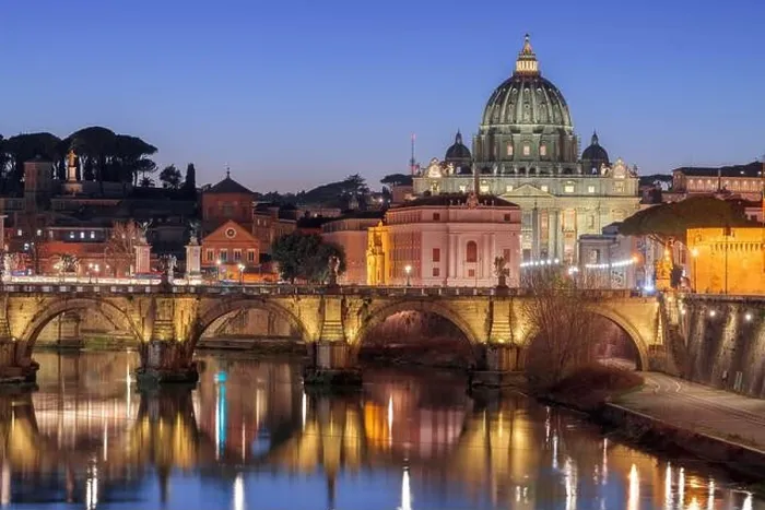 Framed Print : St. Peter's Basilica in Vatican City with the Tiber River passing through Rome, Italy at dusk Framed Print : St. Peter's Basilica in Vatican City with the Tiber River passing through Rome, Italy at dusk