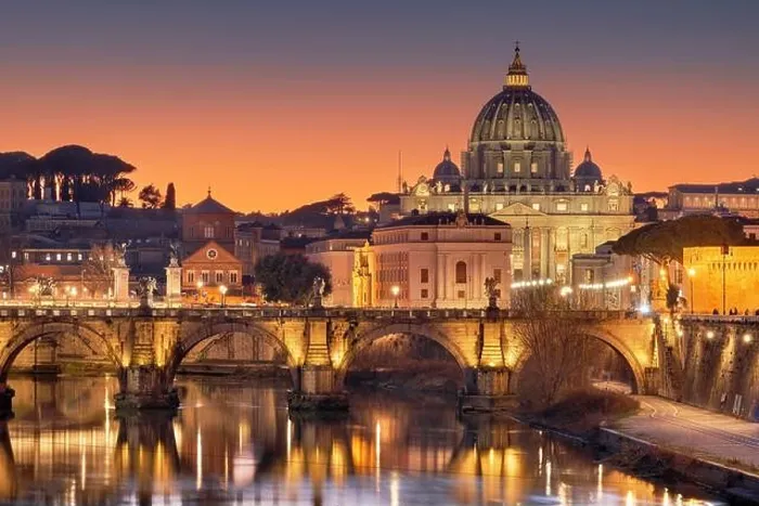 Framed Print : St. Peter's Basilica in Vatican City on the Tiber River through Rome, Italy at dusk Framed Print : St. Peter's Basilica in Vatican City on the Tiber River through Rome, Italy at dusk