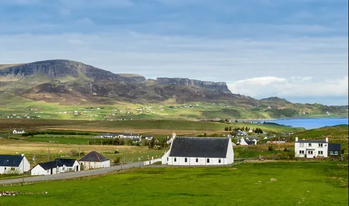 Framed Print : STAFFIN VILLAGE AND RANGE OF HILLS THE TROTTERNISH RIDGE BEHIND THE HOUSES ON THE ISLE OF SKYE SCOTLAND Framed Print : STAFFIN VILLAGE AND RANGE OF HILLS THE TROTTERNISH RIDGE BEHIND THE HOUSES ON THE ISLE OF SKYE SCOTLAND