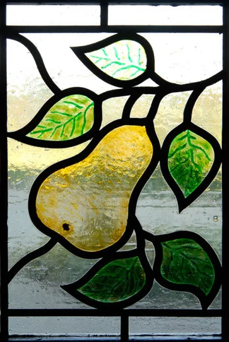 Framed Print : A stained-glass window, part of a door, with a pear motif Framed Print : A stained-glass window, part of a door, with a pear motif