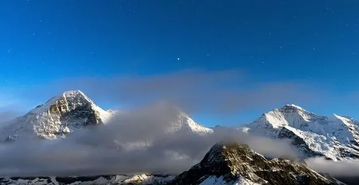 Framed Print : Stars glowing over the snowcapped Eiger, Monch and Jungfrau peaks in the night fog, Mannlichen, Bern canton, Switzerland Framed Print : Stars glowing over the snowcapped Eiger, Monch and Jungfrau peaks in the night fog, Mannlichen, Bern canton, Switzerland