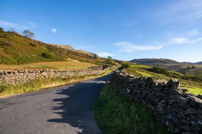 Framed Print : Steep road called The Struggle which links Ambleside with the Kirkstone Pass in the Lake District, Cumbria, England Framed Print : Steep road called The Struggle which links Ambleside with the Kirkstone Pass in the Lake District, Cumbria, England