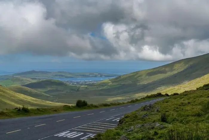 Framed Print : the steep and winding mountain road leading to the top of Connor Pass on the Dingle Peninsula Framed Print : the steep and winding mountain road leading to the top of Connor Pass on the Dingle Peninsula