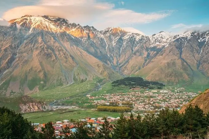 Framed Print : Stepantsminda Village At Sunny Evening Sunset In Kazbegi District, Mtskheta-Mtianeti Region, Georgia. Spring Summer Season Mountains Landscape Framed Print : Stepantsminda Village At Sunny Evening Sunset In Kazbegi District, Mtskheta-Mtianeti Region, Georgia. Spring Summer Season Mountains Landscape
