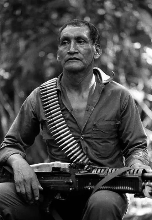 Framed Print : Stock image of a URNG guerrilla with a machine gun in the Ixcan Jungle Guatemala during the civil war there Framed Print : Stock image of a URNG guerrilla with a machine gun in the Ixcan Jungle Guatemala during the civil war there