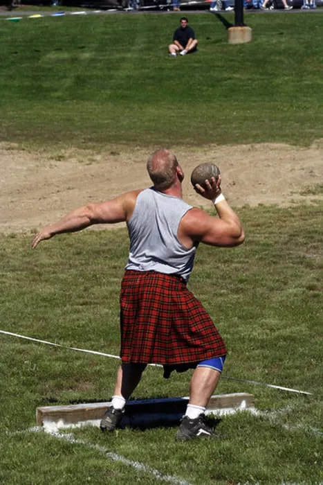 Framed Print : Stone put. Man is throwing Stone.Highland Games. Special Event part of the Last Fling in Naperville Framed Print : Stone put. Man is throwing Stone.Highland Games. Special Event part of the Last Fling in Naperville